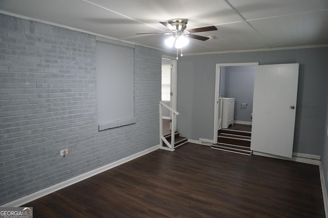 39 Mcferrin Cir, Riverdale, GA 30274 - empty room featuring ceiling fan, wood finished floors, brick wall, ornamental molding, and stairs