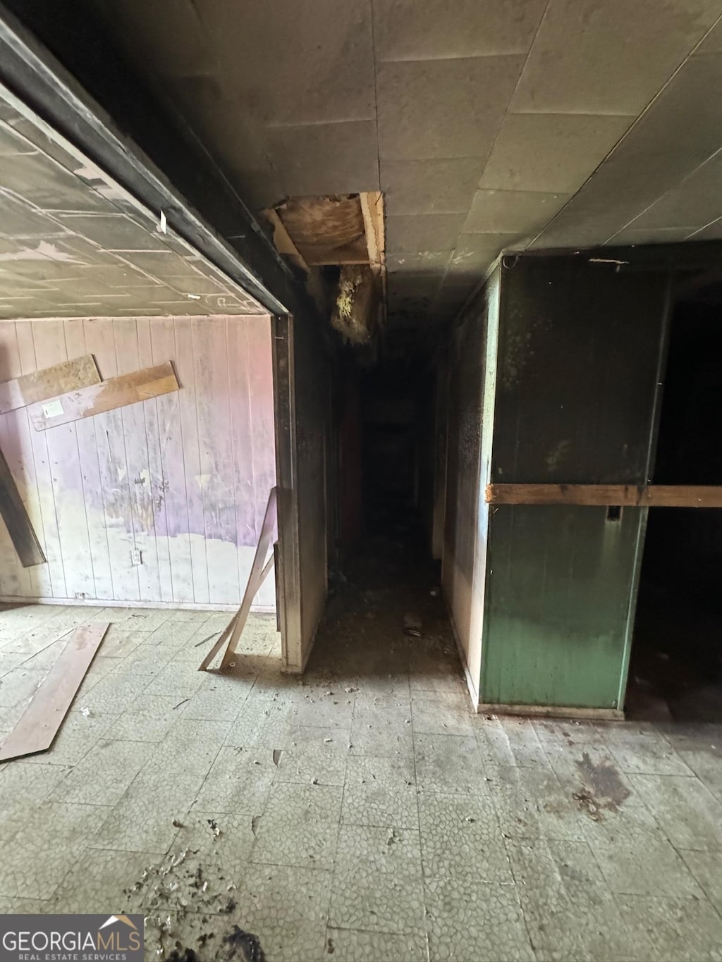 303 Hudson St, Dublin, GA 31021 - corridor featuring wood walls