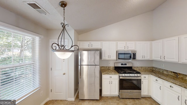 3157 Peartree Dr NW, Acworth, GA 30101 - kitchen with appliances with stainless steel finishes, vaulted ceiling, white cabinets, stone countertops, and a textured ceiling