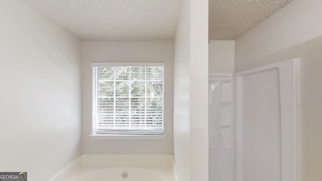 3157 Peartree Dr NW, Acworth, GA 30101 - full bath with a textured ceiling and a garden tub