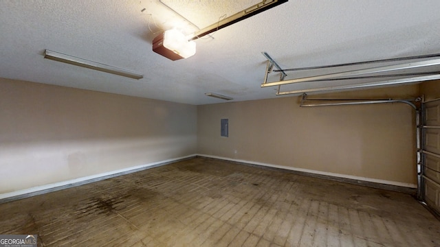 3157 Peartree Dr NW, Acworth, GA 30101 - garage with a garage door opener and electric panel