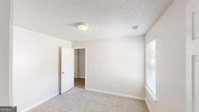3157 Peartree Dr NW, Acworth, GA 30101 - unfurnished room with light carpet and a textured ceiling