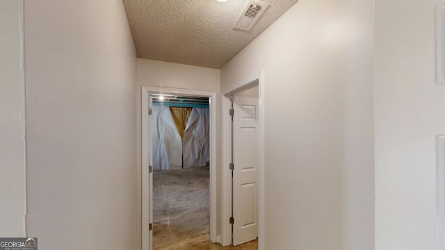 3157 Peartree Dr NW, Acworth, GA 30101 - hallway featuring a textured ceiling