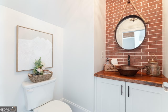 2816 Oconee Springs Dr, Statham, GA 30666 - half bathroom featuring tasteful backsplash and vanity