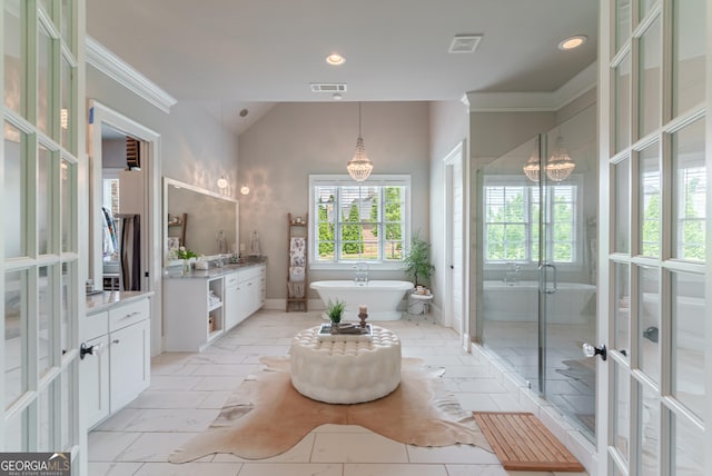 2816 Oconee Springs Dr, Statham, GA 30666 - bathroom with vanity, a soaking tub, a shower stall, recessed lighting, and lofted ceiling