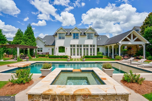 2816 Oconee Springs Dr, Statham, GA 30666 - view of swimming pool with a patio area and a pool with connected hot tub