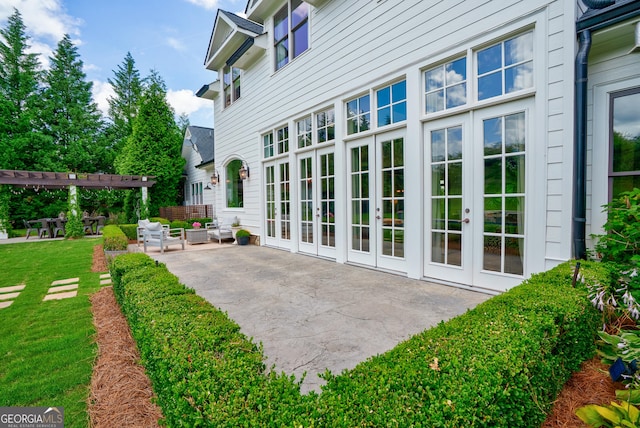 2816 Oconee Springs Dr, Statham, GA 30666 - view of patio with a pergola, an outdoor hangout area, and french doors