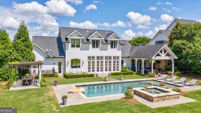 2816 Oconee Springs Dr, Statham, GA 30666 - back of property with a patio area, a yard, a pergola, and roof with shingles