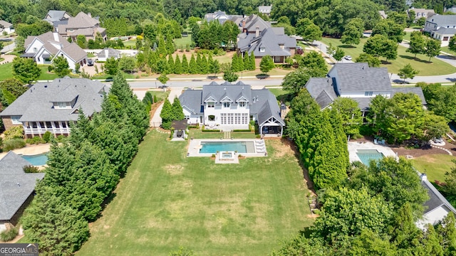 2816 Oconee Springs Dr, Statham, GA 30666 - aerial perspective of suburban area with a pool