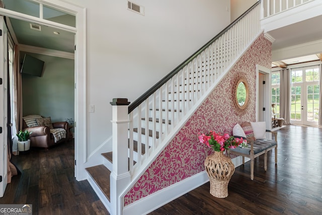 2816 Oconee Springs Dr, Statham, GA 30666 - stairs featuring ornamental molding, wallpapered walls, wood-type flooring, and french doors