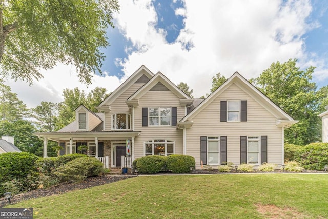 1461 Radstone Dr, Lawrenceville, GA 30044 - traditional home with a front lawn and a porch