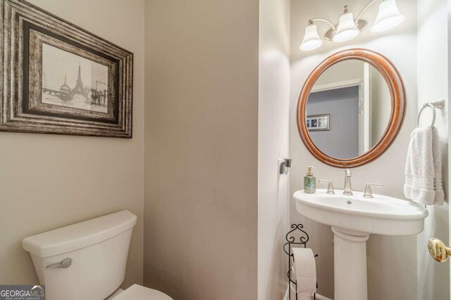 1461 Radstone Dr, Lawrenceville, GA 30044 - half bathroom featuring toilet