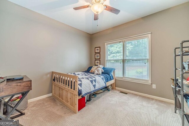 1461 Radstone Dr, Lawrenceville, GA 30044 - bedroom with light carpet and ceiling fan