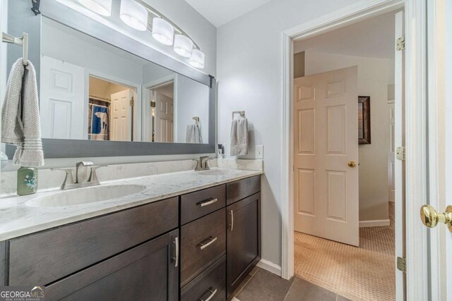 1461 Radstone Dr, Lawrenceville, GA 30044 - full bath with double vanity and tile patterned floors