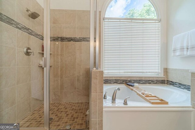 1461 Radstone Dr, Lawrenceville, GA 30044 - full bathroom featuring a shower stall and a bath