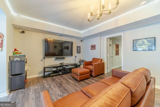 1461 Radstone Dr, Lawrenceville, GA 30044 - living room featuring a chandelier and wood finished floors