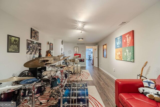 1461 Radstone Dr, Lawrenceville, GA 30044 - living room featuring wood finished floors and baseboards
