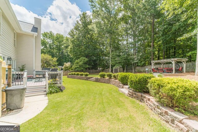 1461 Radstone Dr, Lawrenceville, GA 30044 - fenced backyard featuring a wooden deck