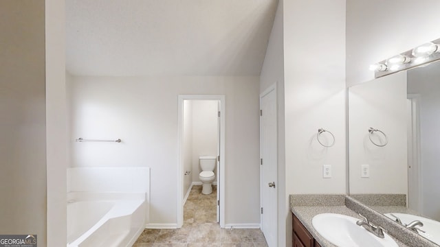 1001 Balsam Wood Trl, Villa Rica, GA 30180 - full bathroom featuring a bath, vanity, and tile patterned floors
