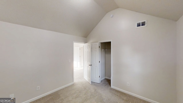 1001 Balsam Wood Trl, Villa Rica, GA 30180 - unfurnished bedroom with vaulted ceiling and carpet flooring
