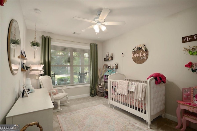 112 Sterling Lake Way, Jefferson, GA 30549 - bedroom featuring a crib, light colored carpet, and a ceiling fan