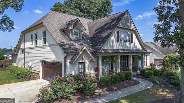 112 Sterling Lake Way, Jefferson, GA 30549 - view of front of house featuring an attached garage, board and batten siding, a porch, driveway, and roof with shingles