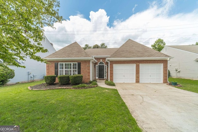 2895 Dominion Walk Ln, Snellville, GA 30078 - view of front of property with an attached garage, brick siding, a front yard, and concrete driveway