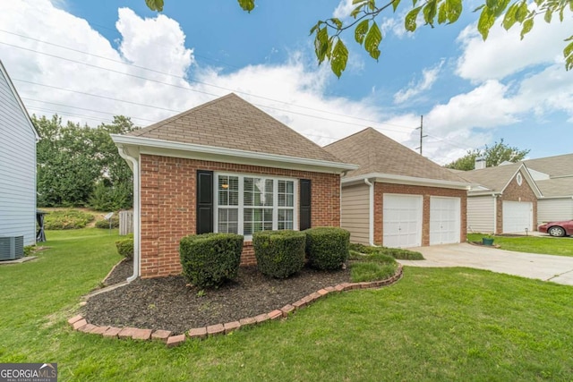 2895 Dominion Walk Ln, Snellville, GA 30078 - view of front of house with brick siding, a front lawn, roof with shingles, driveway, and a garage