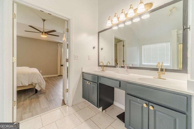 2895 Dominion Walk Ln, Snellville, GA 30078 - ensuite bathroom with double vanity, ceiling fan, and tile patterned floors