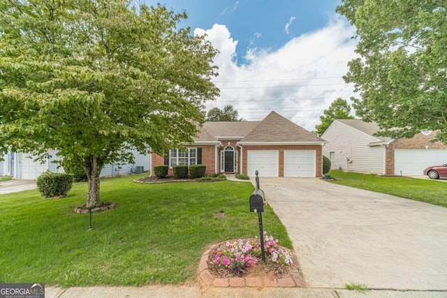 2895 Dominion Walk Ln, Snellville, GA 30078 - view of front facade with an attached garage, concrete driveway, a front lawn, and brick siding