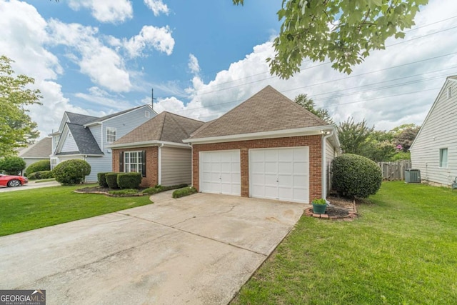 2895 Dominion Walk Ln, Snellville, GA 30078 - view of front facade with brick siding, a garage, driveway, and roof with shingles