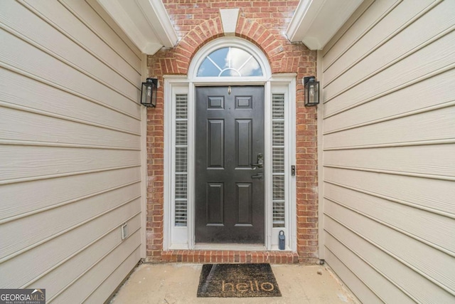 2895 Dominion Walk Ln, Snellville, GA 30078 - doorway to property featuring brick siding