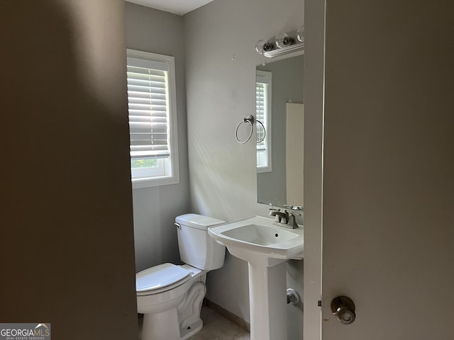 1701 Charmeth Rd, Lithonia, GA 30058 - bathroom featuring toilet and baseboards