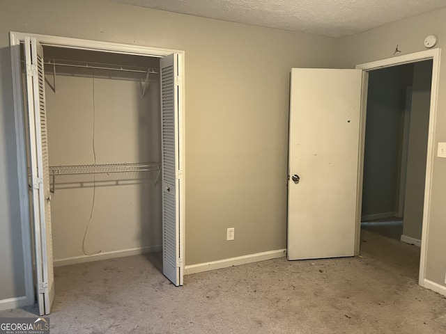 1701 Charmeth Rd, Lithonia, GA 30058 - unfurnished bedroom featuring a closet and carpet floors