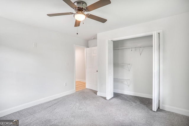 911 Oakland Dr SW, Atlanta, GA 30310 - unfurnished bedroom featuring carpet, a closet, and a ceiling fan