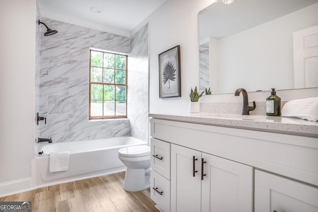911 Oakland Dr SW, Atlanta, GA 30310 - full bathroom with vanity, shower / bath combination, and wood finished floors