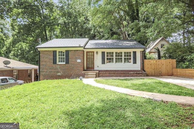 911 Oakland Dr SW, Atlanta, GA 30310 - view of front of house featuring brick siding and roof with shingles