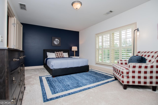 713 Birkdale Blvd, Carrollton, GA 30116 - bedroom featuring light colored carpet and an accent wall
