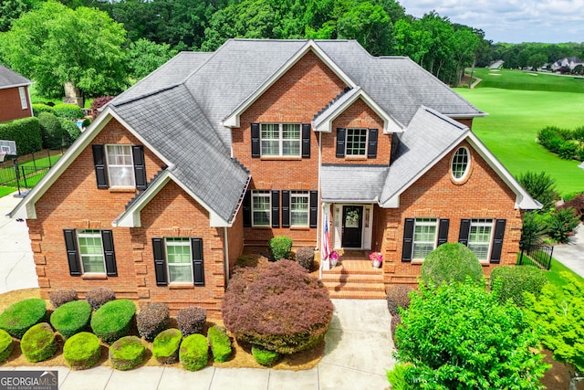 713 Birkdale Blvd, Carrollton, GA 30116 - traditional-style home featuring brick siding and a shingled roof