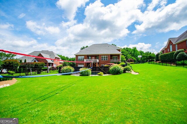 713 Birkdale Blvd, Carrollton, GA 30116 - back of house featuring volleyball court