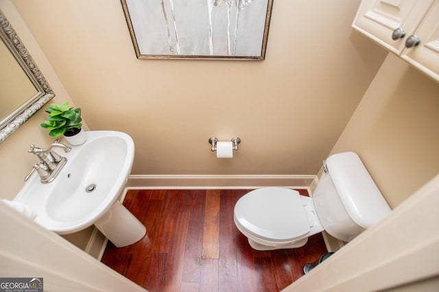 713 Birkdale Blvd, Carrollton, GA 30116 - bathroom featuring wood finished floors and baseboards
