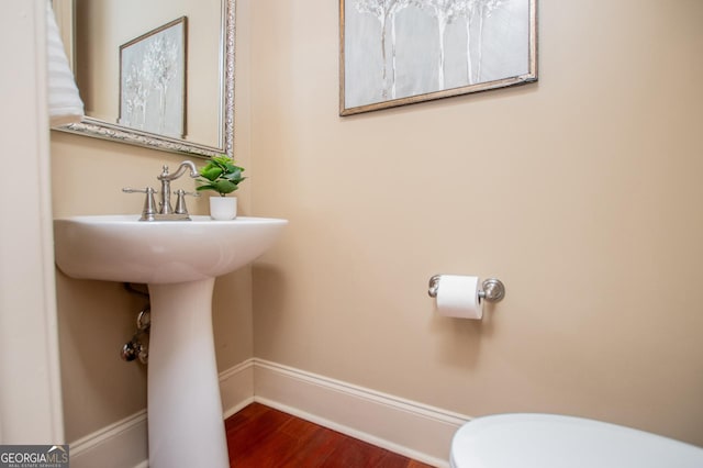 713 Birkdale Blvd, Carrollton, GA 30116 - bathroom featuring toilet and wood finished floors