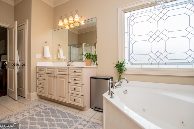 713 Birkdale Blvd, Carrollton, GA 30116 - full bath featuring ornamental molding, a chandelier, vanity, a whirlpool tub, and tile patterned floors