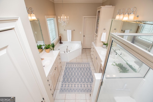 713 Birkdale Blvd, Carrollton, GA 30116 - full bath with tile patterned flooring, two vanities, a bath, a chandelier, and crown molding