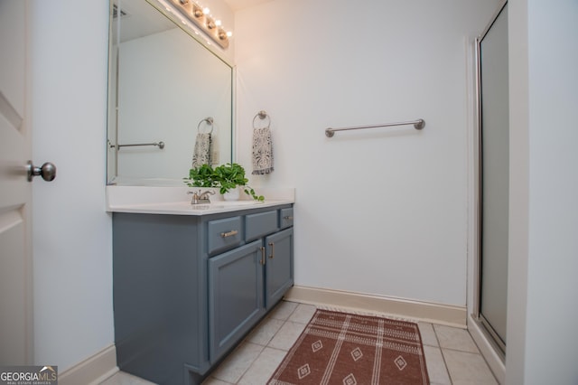 713 Birkdale Blvd, Carrollton, GA 30116 - full bath with vanity, tile patterned flooring, and a shower with door