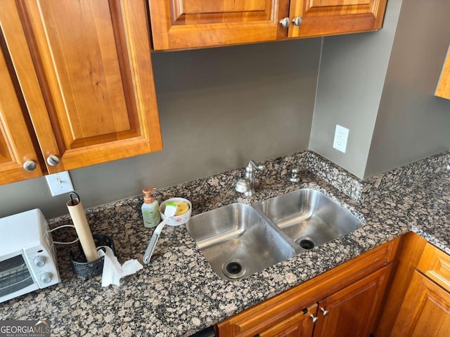 2479 Peachtree Rd NE Unit 1714, Atlanta, GA 30305 - kitchen view of brown cabinets and dark stone countertops