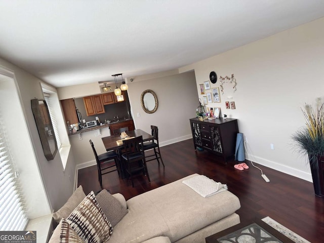 2479 Peachtree Rd NE Unit 1714, Atlanta, GA 30305 - living area featuring dark wood-type flooring and baseboards