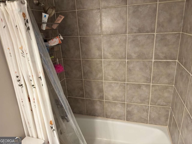 2479 Peachtree Rd NE Unit 1714, Atlanta, GA 30305 - bathroom with shower / bath combo with shower curtain