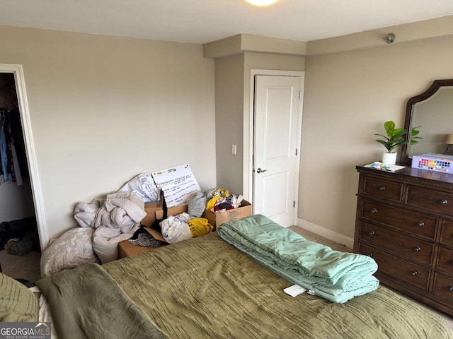 2479 Peachtree Rd NE Unit 1714, Atlanta, GA 30305 - bedroom featuring light colored carpet and baseboards