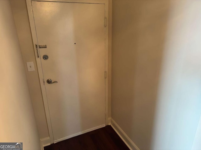 2479 Peachtree Rd NE Unit 1714, Atlanta, GA 30305 - hallway featuring dark wood finished floors and baseboards